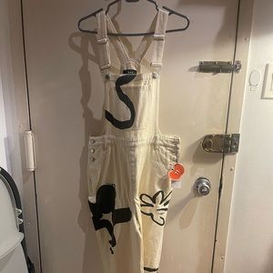 Cream and black overalls